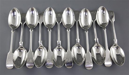 A set of twelve Victorian silver fiddle pattern dessert spoons, Length 7”/178mm Total weight 19.6oz/556grms